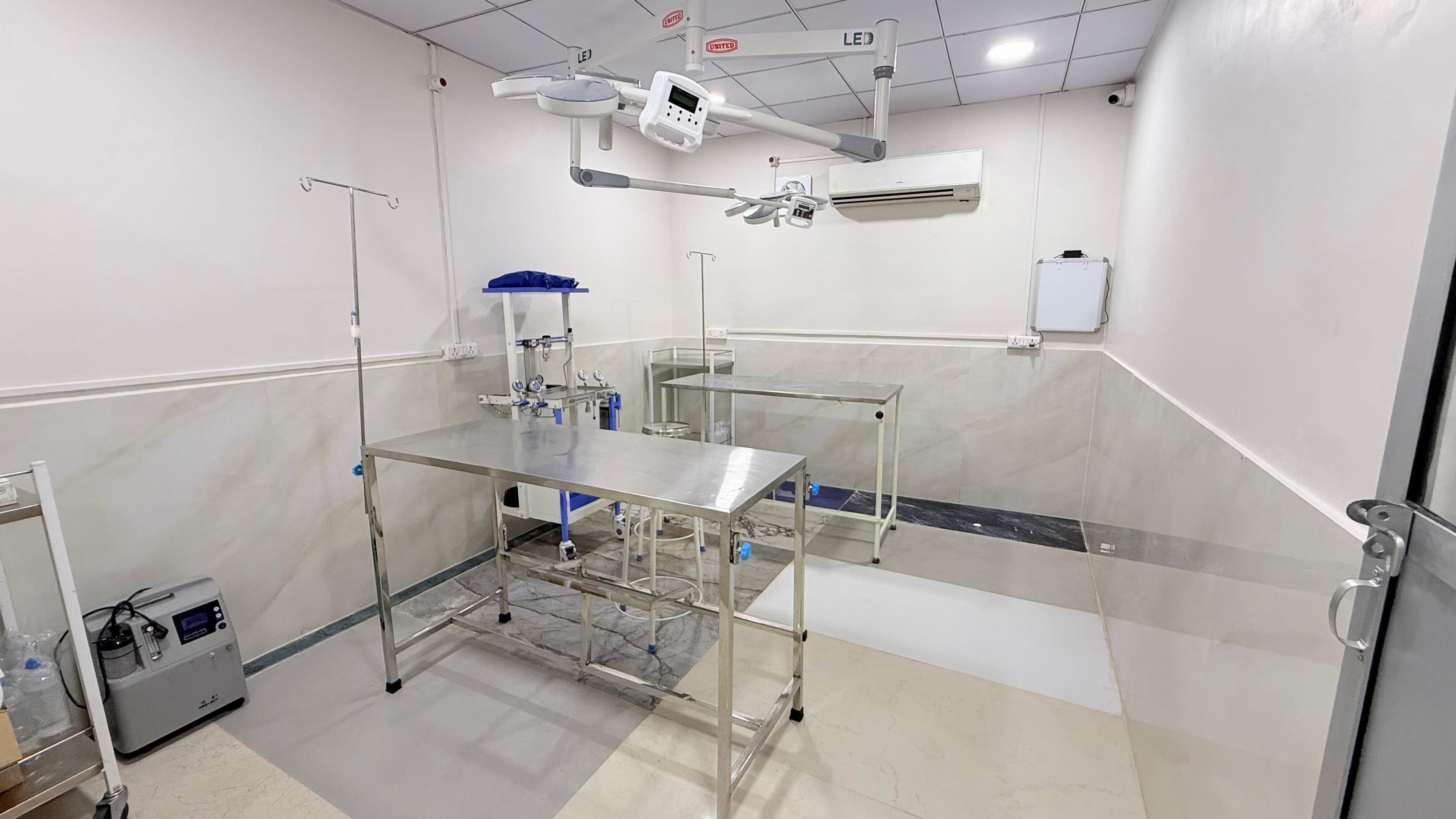 Prepared clinical procedure room inside Milli Memorial Dog Hospital